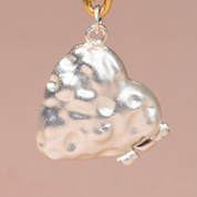 Dije relicario con textura - Trazzo Joyería